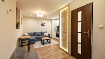 Appartement Supérieur | Salle de séjour | Télévision à écran plat