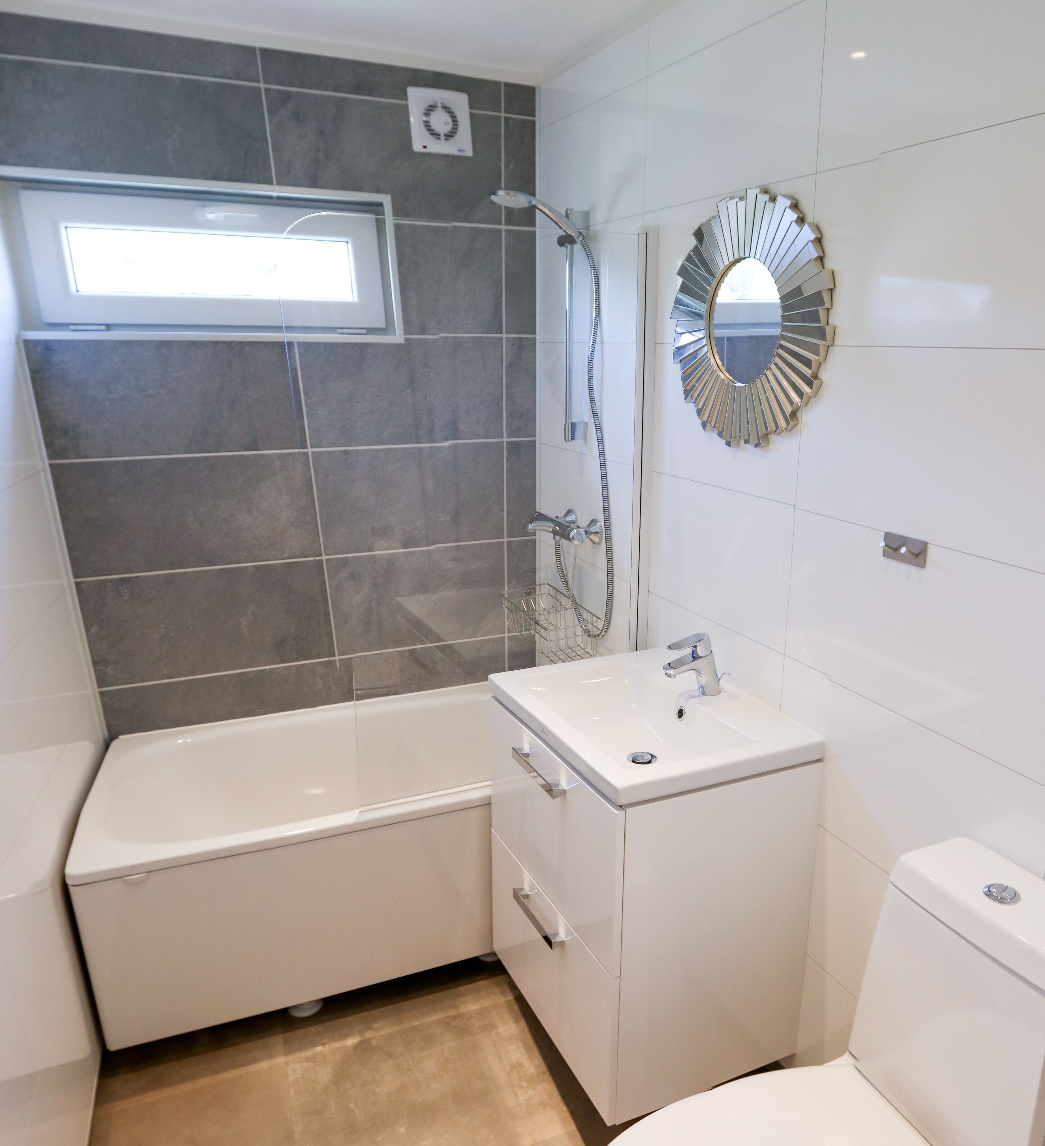 Combined shower/tub, hair dryer, towels, soap
