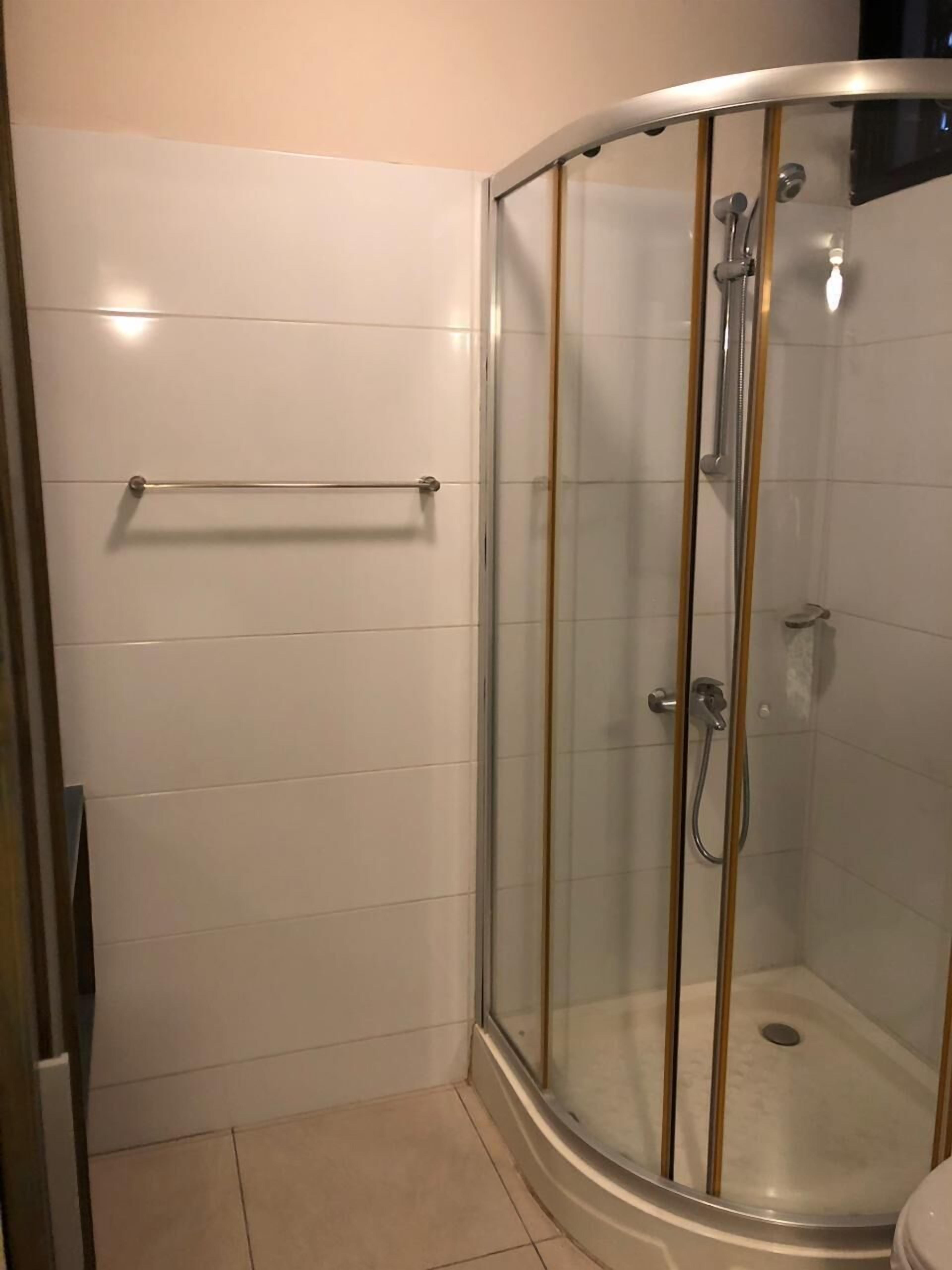 Honeymoon Apartment | Bathroom | Shower, towels