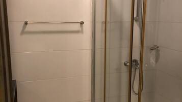 Honeymoon Apartment | Bathroom | Shower, towels