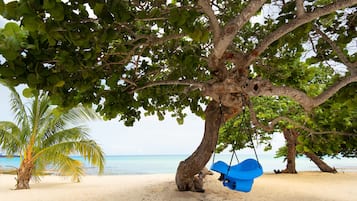 Ubicación a pie de playa, tumbonas y toallas de playa