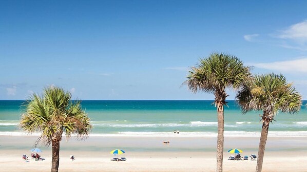 On the beach, sun-loungers, beach towels