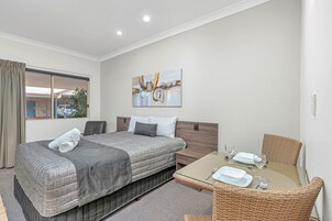 Studio Queen Room | Desk, laptop workspace, soundproofing, iron/ironing board