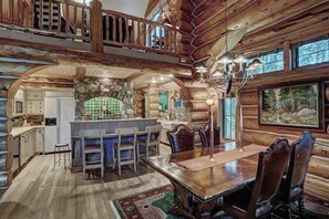 Deluxe House | Living area | Flat-screen TV, fireplace