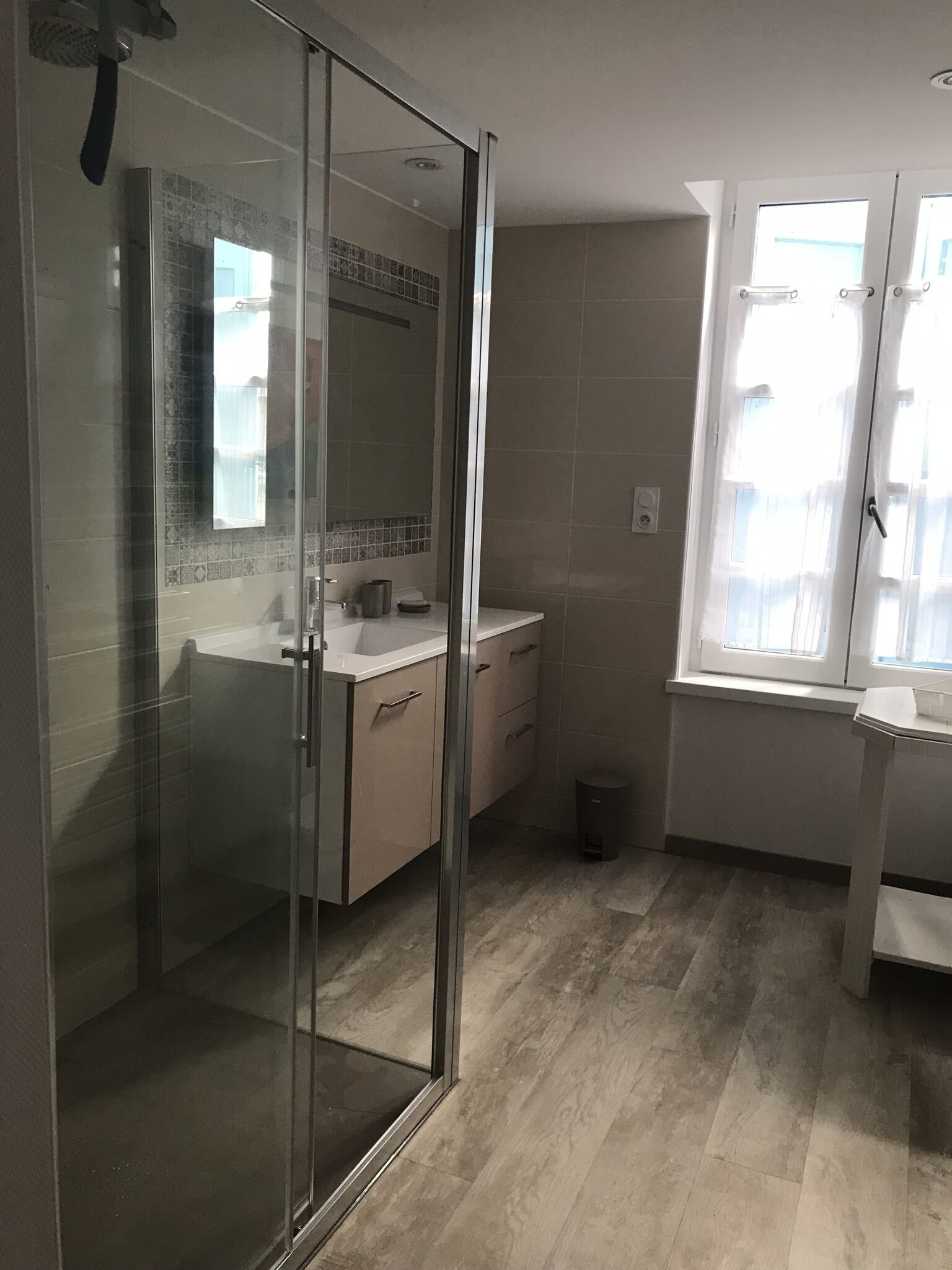 Shower, hair dryer, towels, toilet paper