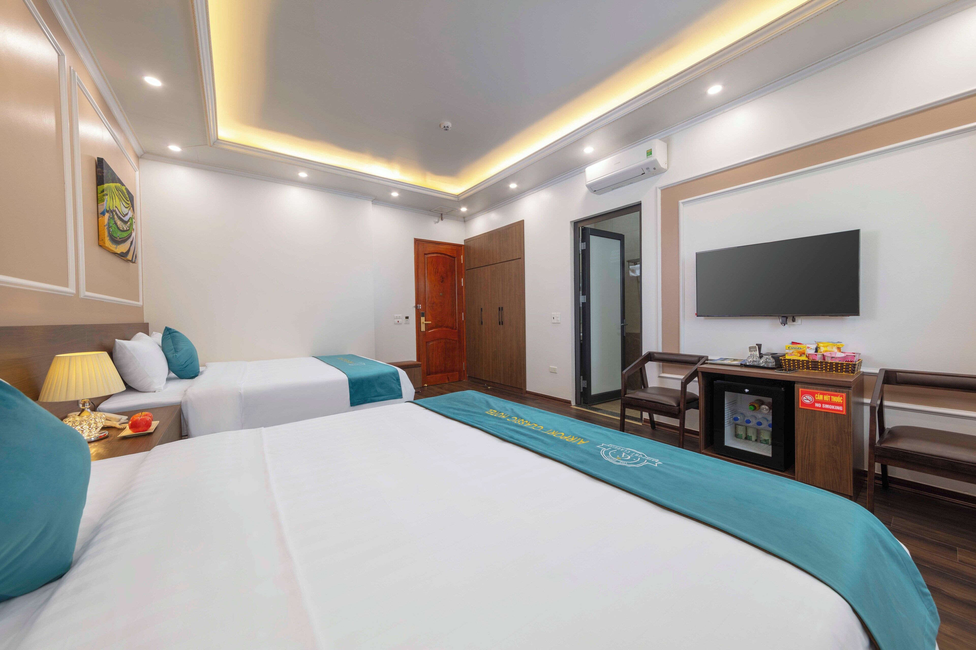 deluxe family room, with window (free one way airport transfer) | minibar, in-room safe, individually furnished, desk