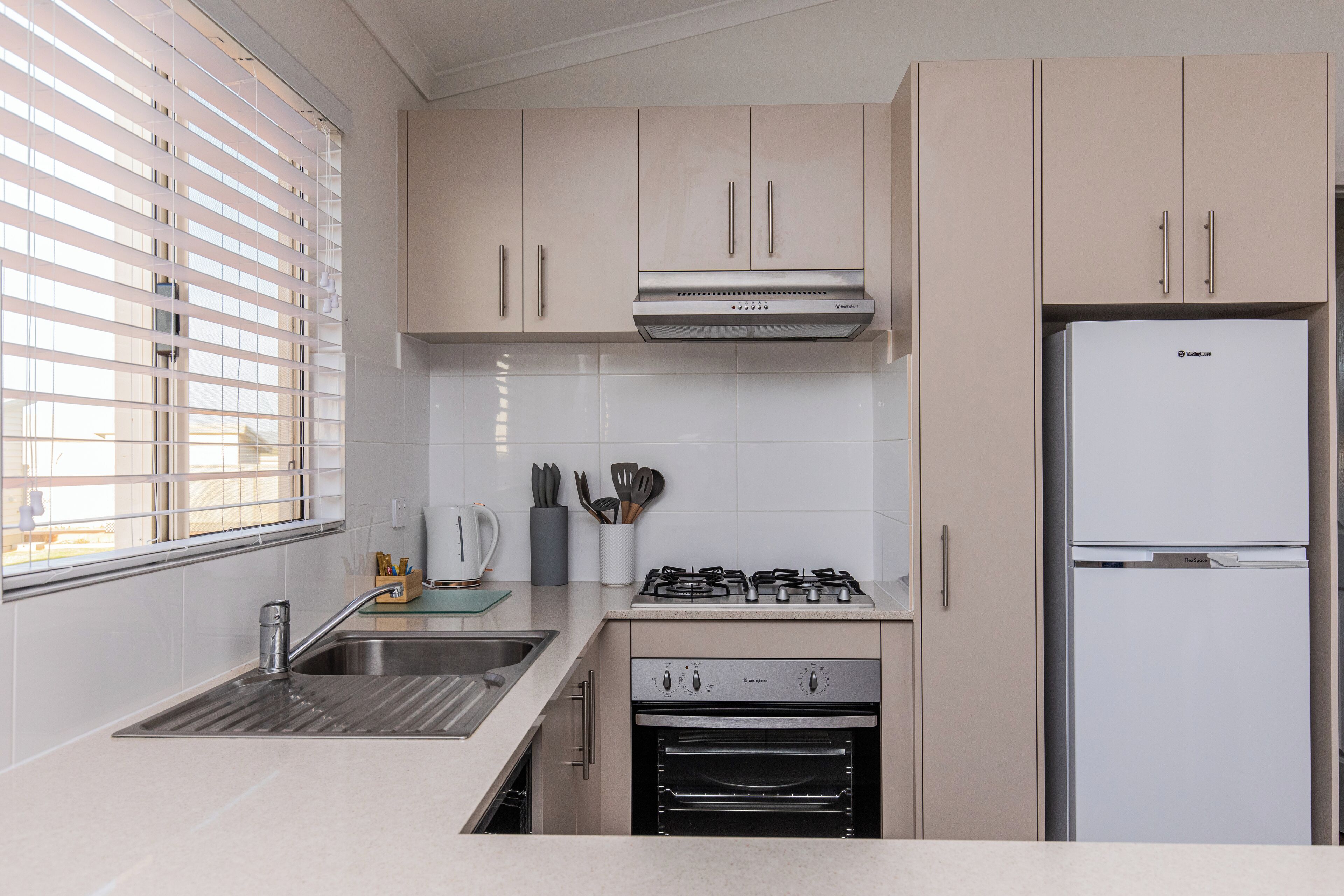 full-sized fridge, microwave, oven, stovetop