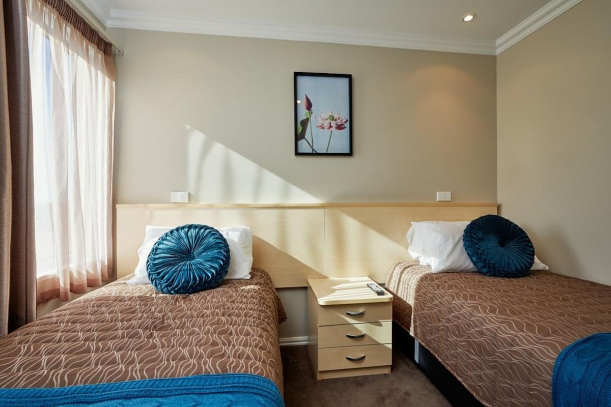 Premium bedding, blackout drapes, iron/ironing board, WiFi (free)