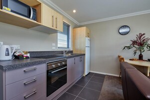 Microwave, stovetop, coffee/tea maker, electric kettle