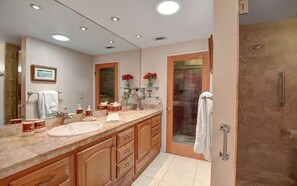 Combined shower/tub, hair dryer, towels, soap