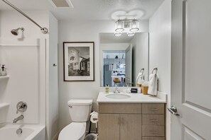 Hair dryer, towels, soap, shampoo