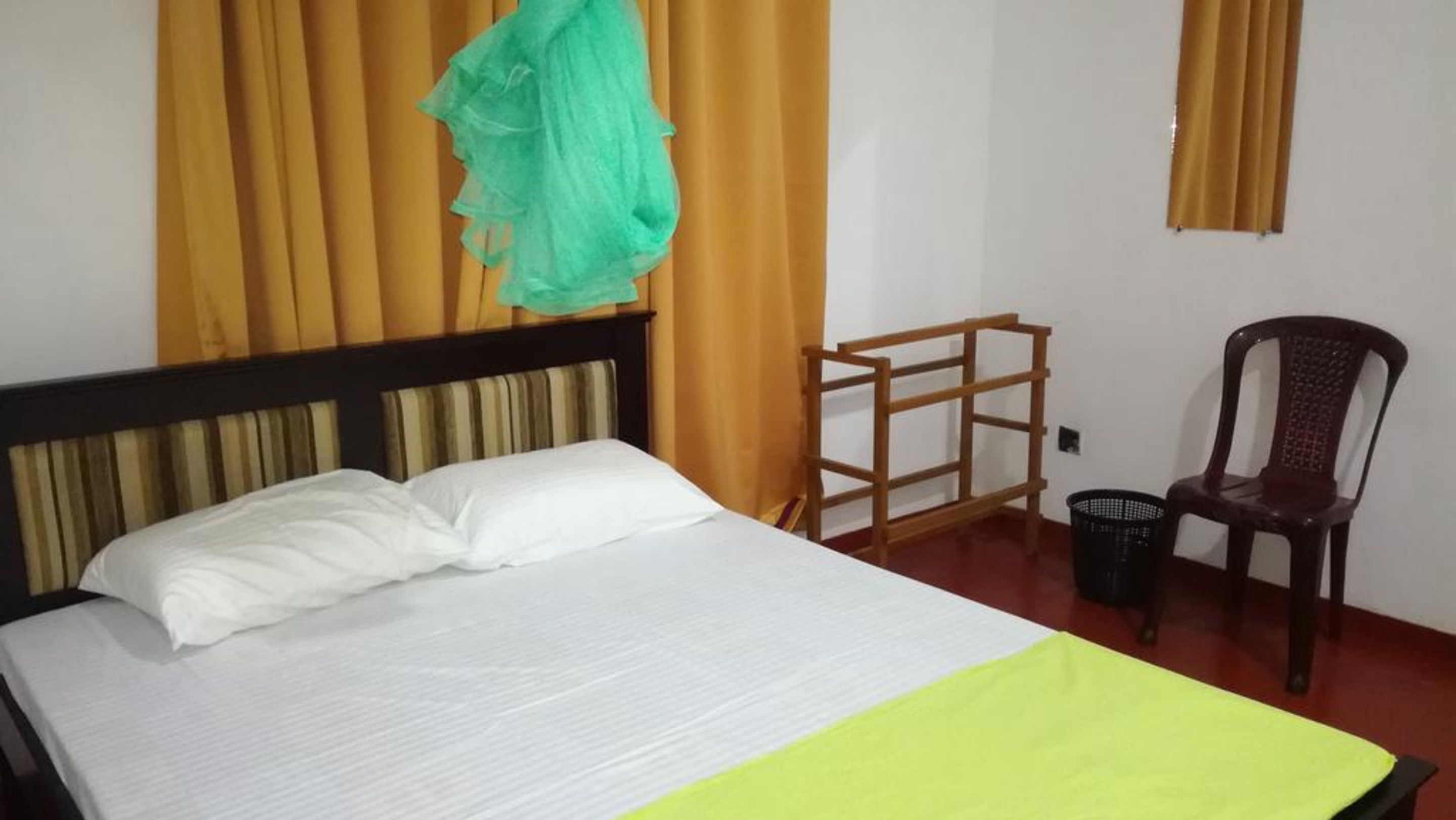Blackout curtains, iron/ironing board, bed sheets