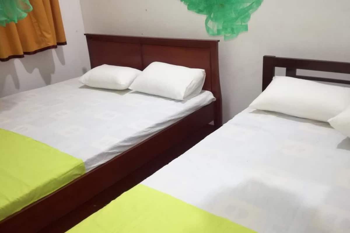 Blackout curtains, iron/ironing board (on request), bed sheets
