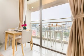 Luxury Room, 1 Bedroom, Kitchenette, City View | Individually decorated, individually furnished, desk, iron/ironing board