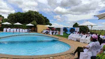 Outdoor pool, pool umbrellas, pool loungers