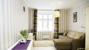 Apartamento, 1 quarto | Área de estar