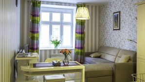 Apartamento, 1 quarto | Área de estar