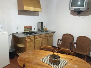 Fridge, microwave, stovetop, cookware/dishes/utensils