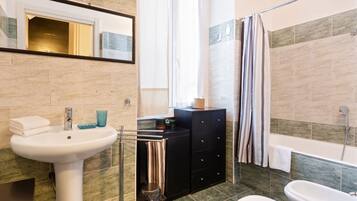 Apartment, 1 Bedroom, Non Smoking | Bathroom | Shower, rainfall showerhead, hair dryer, bidet