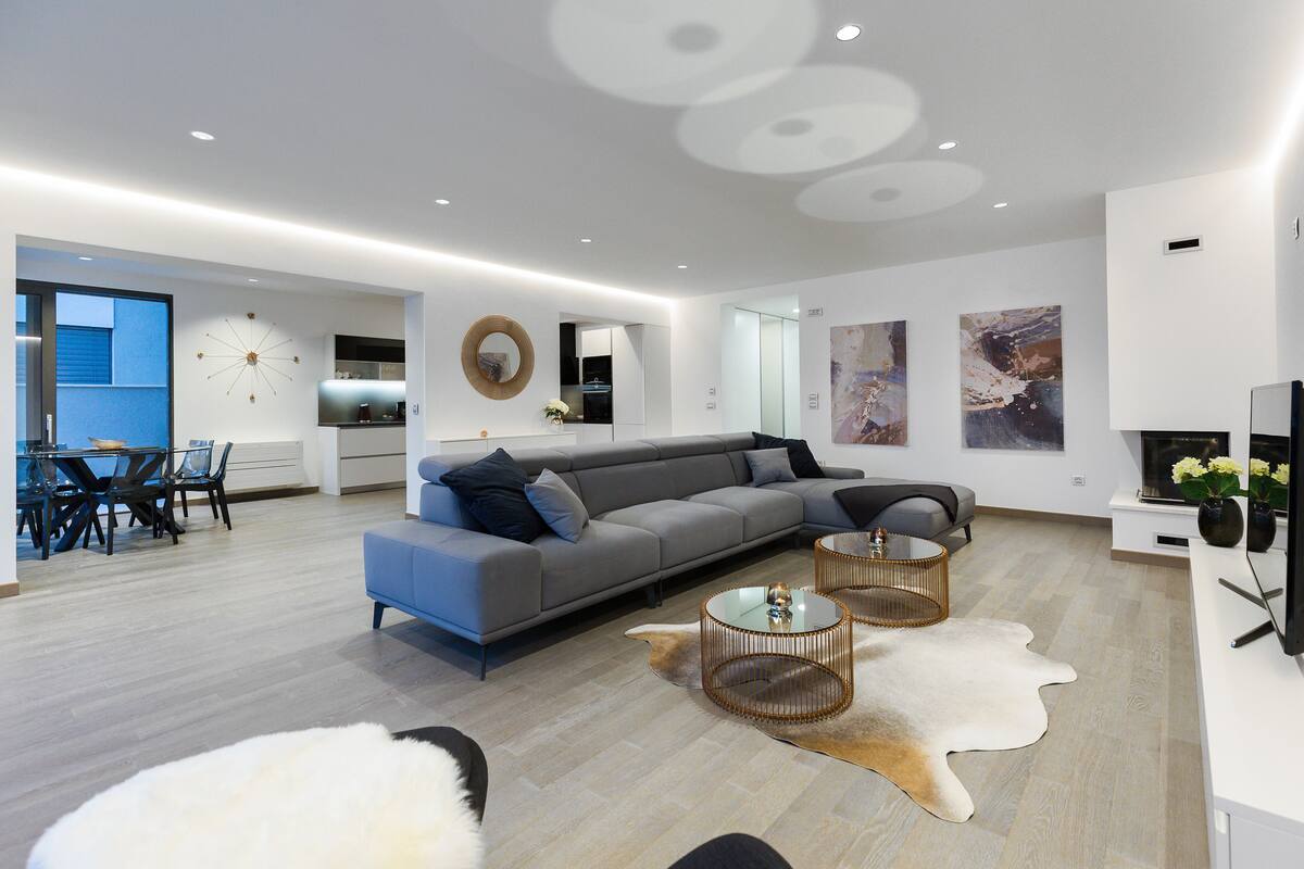 Luxury Apartment, 2 Bedrooms, Hot Tub, Partial Sea View | Living area | Flat-screen TV, fireplace, heated floors