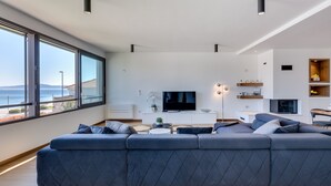 Luxury Apartment, 2 Bedrooms, Hot Tub, Sea View | Living area | Flat-screen TV, fireplace, heated floors - Shell Luxury Residences (Zadar)