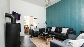 Family House, 4 Bedrooms | Living area | Flat-screen TV, fireplace