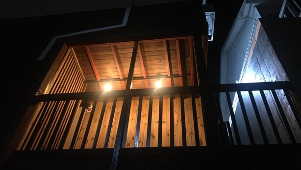 A building with a wooden structure and a visible window. - Hago Guest House (Tongyeong)