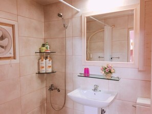 Shower, free toiletries, hair dryer, slippers