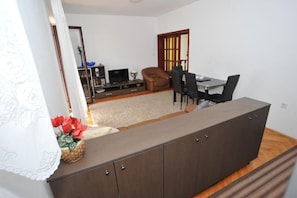 Lägenhet - 2 sovrum | Vardagsrum | Platt-tv