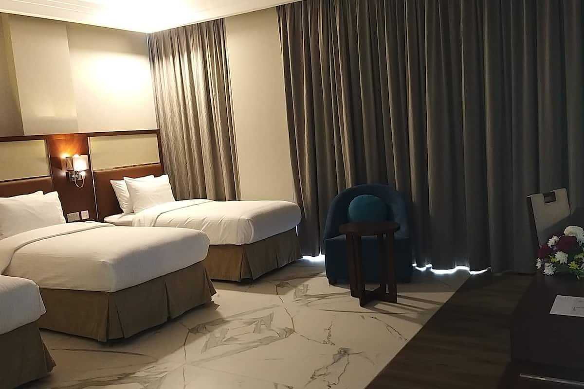 standard triple room | frette italian sheets, premium bedding, down duvets, memory-foam beds