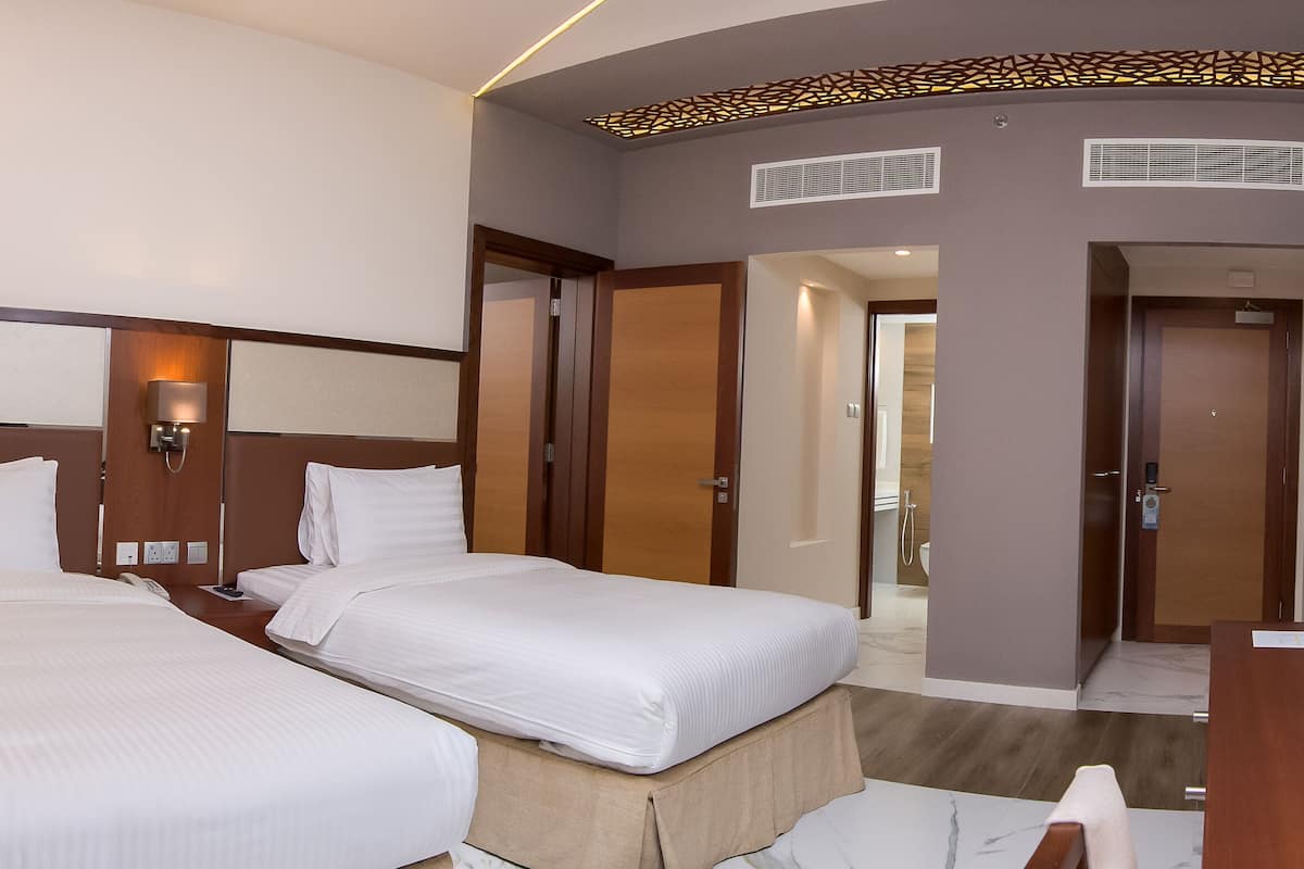 standard twin room | frette italian sheets, premium bedding, down duvets, memory-foam beds