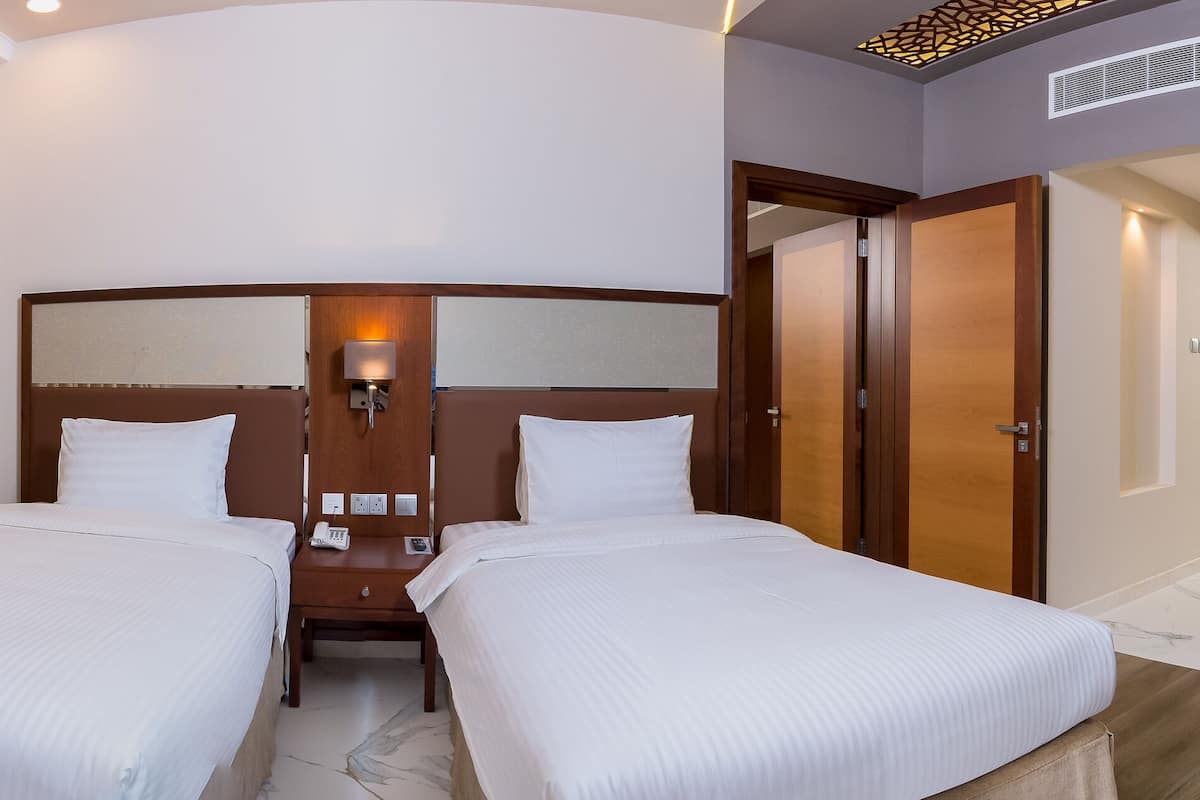 standard twin room | frette italian sheets, premium bedding, down duvets, memory-foam beds