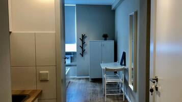 Fridge, electric kettle, cookware/dishes/utensils