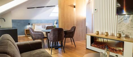 Premium Studio Suite, 1 Bedroom, City View | Living area | Flat-screen TV, Netflix, streaming services