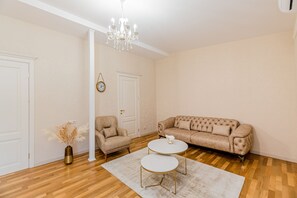 Family Penthouse | Living area | Flat-screen TV