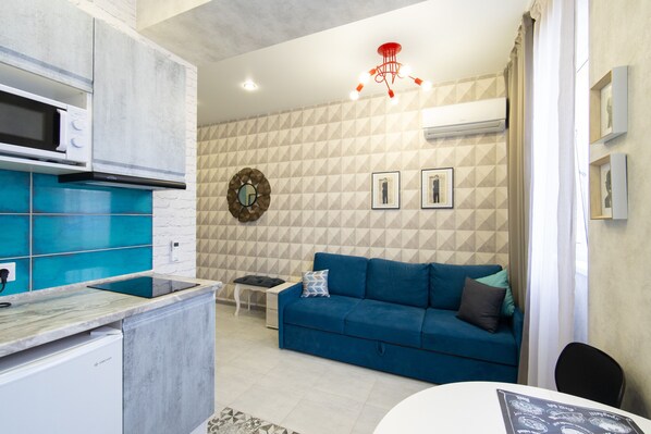 Apartamento | Área de estar | TV de tela plana