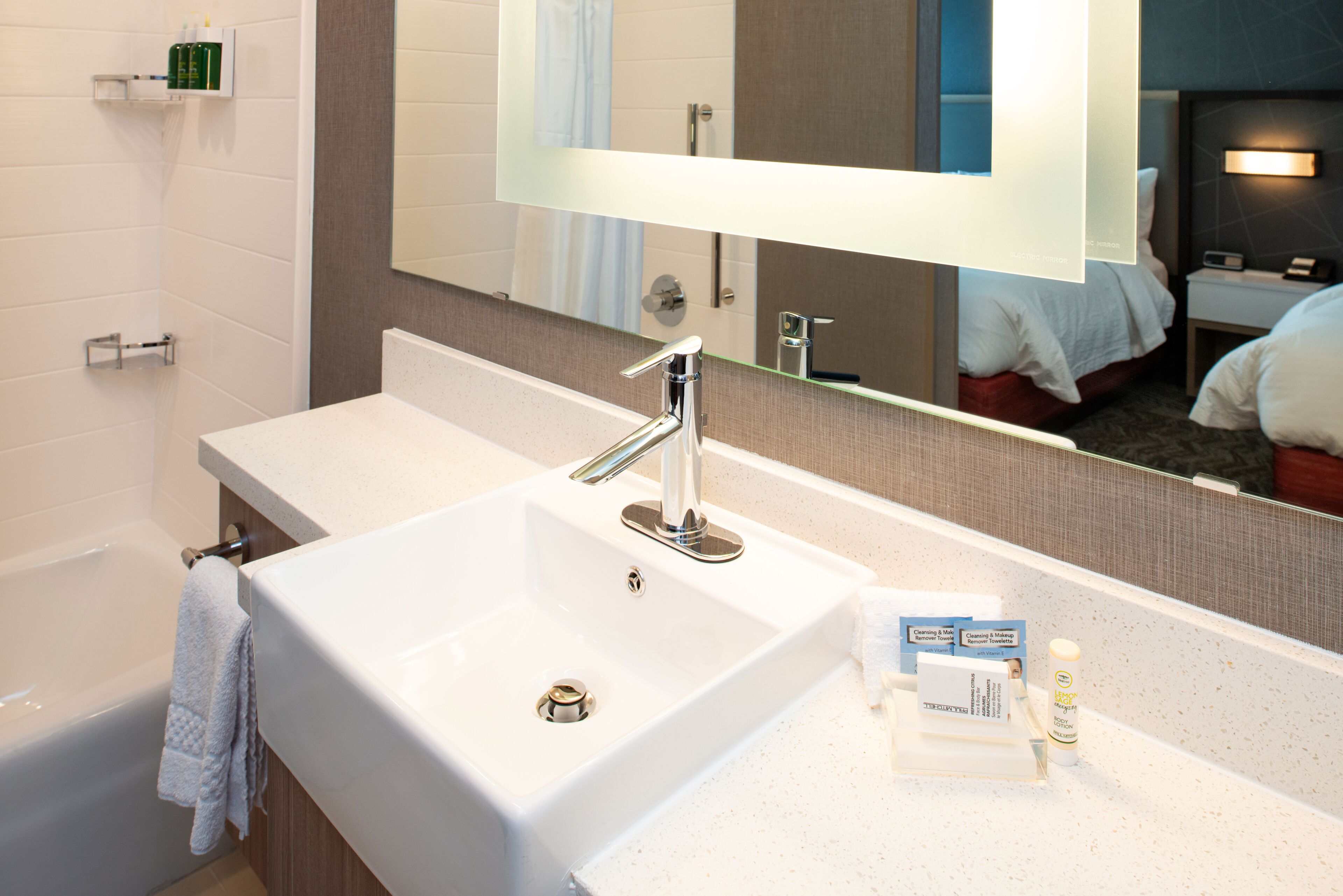suite, multiple beds, non smoking | bathroom | designer toiletries, hair dryer, towels, soap