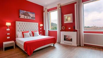 Deluxe Double Room, City View (Tetti Rossi) | Minibar, in-room safe, blackout drapes, soundproofing