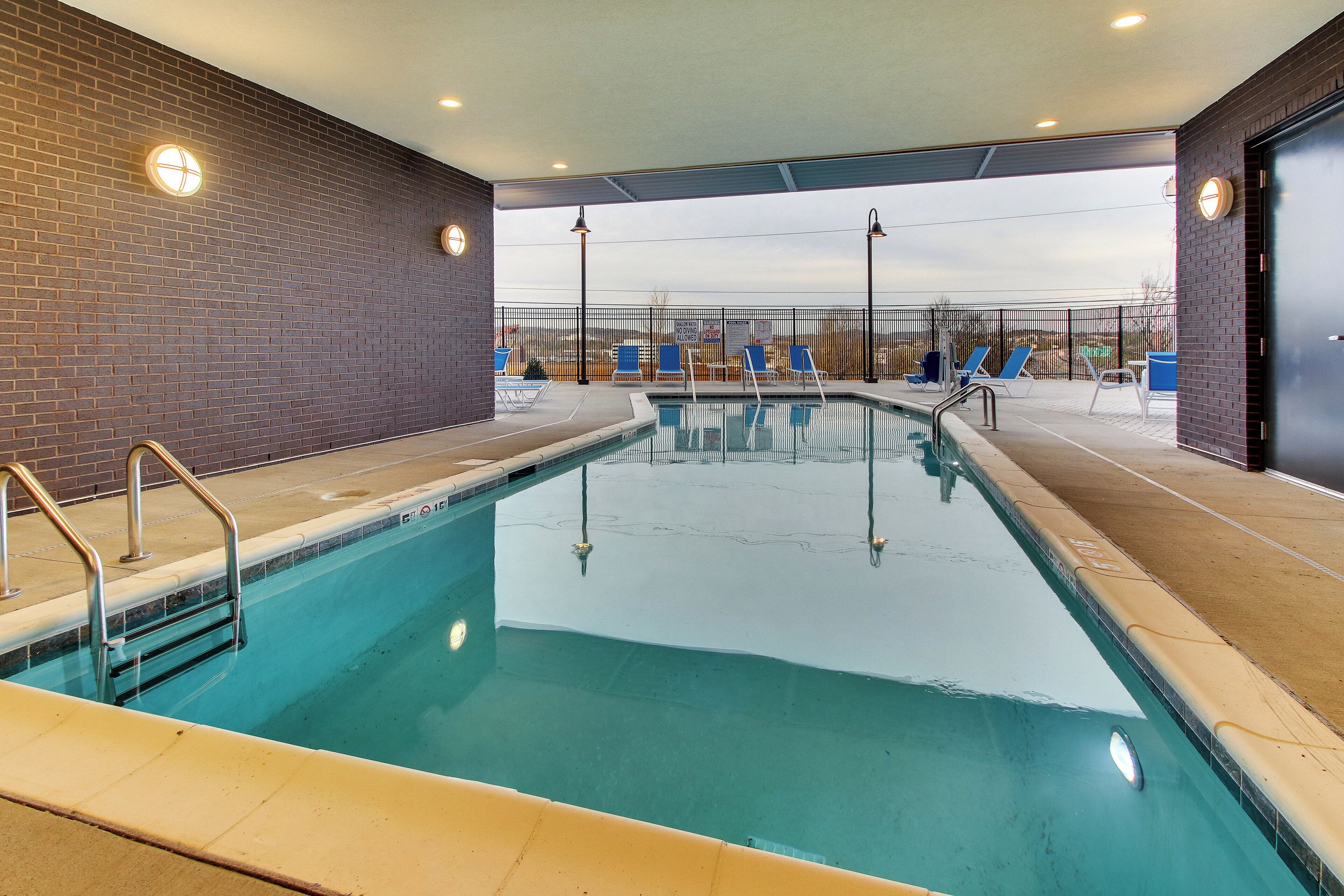 Outdoor pool, open 9:00 AM to 9:00 PM, pool loungers