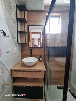 Shower, towels, toilet paper