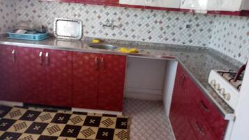 Basic Apartment | Private kitchen | Full-sized fridge, oven, stovetop, electric kettle