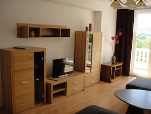 Condo Confort, 1 chambre, non-fumeur | Aire de séjour | Téléviseur à écran plat, planchers chauffants