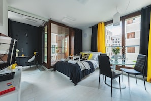 Appartement exclusif | Aire de séjour | Téléviseur à écran plat
