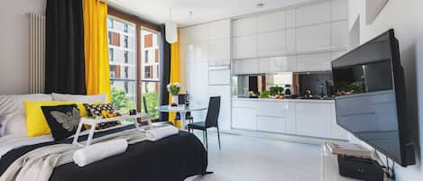 Exclusive Apartment | Living area | Flat-screen TV