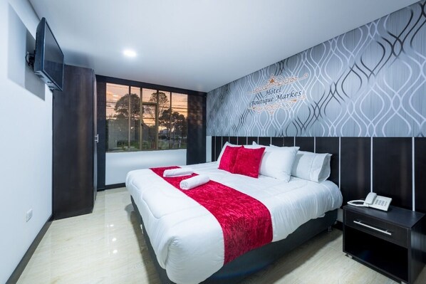 Premium bedding, down duvets, minibar, desk