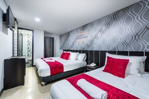 Premium bedding, down duvets, minibar, desk