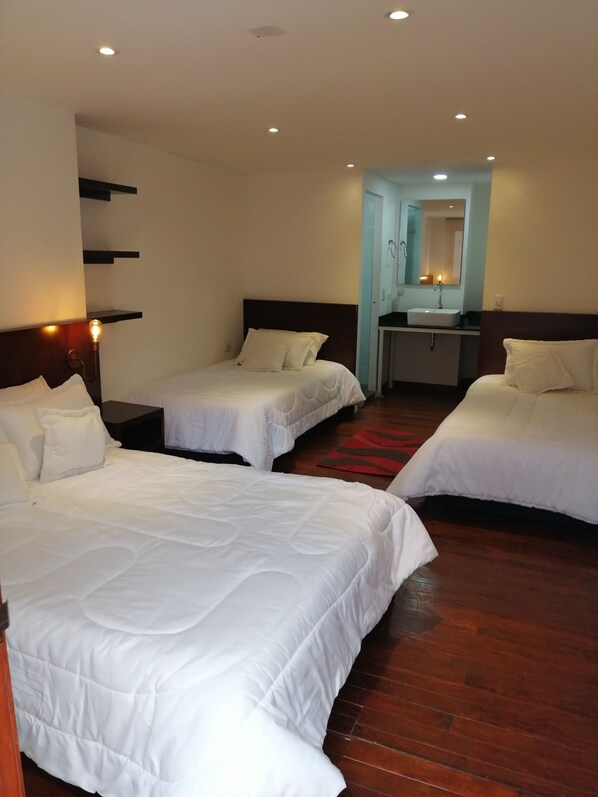 Standard Quadruple Room | Blackout drapes, free WiFi, bed sheets