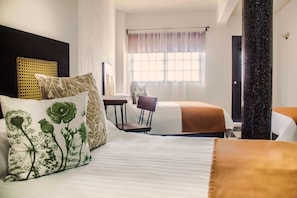 Family Room, Multiple Beds | Laptop workspace, blackout curtains, iron/ironing board, free WiFi - Hotel Múcara (Veracruz)