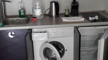 Microwave, coffee/tea maker, cookware/dishes/utensils
