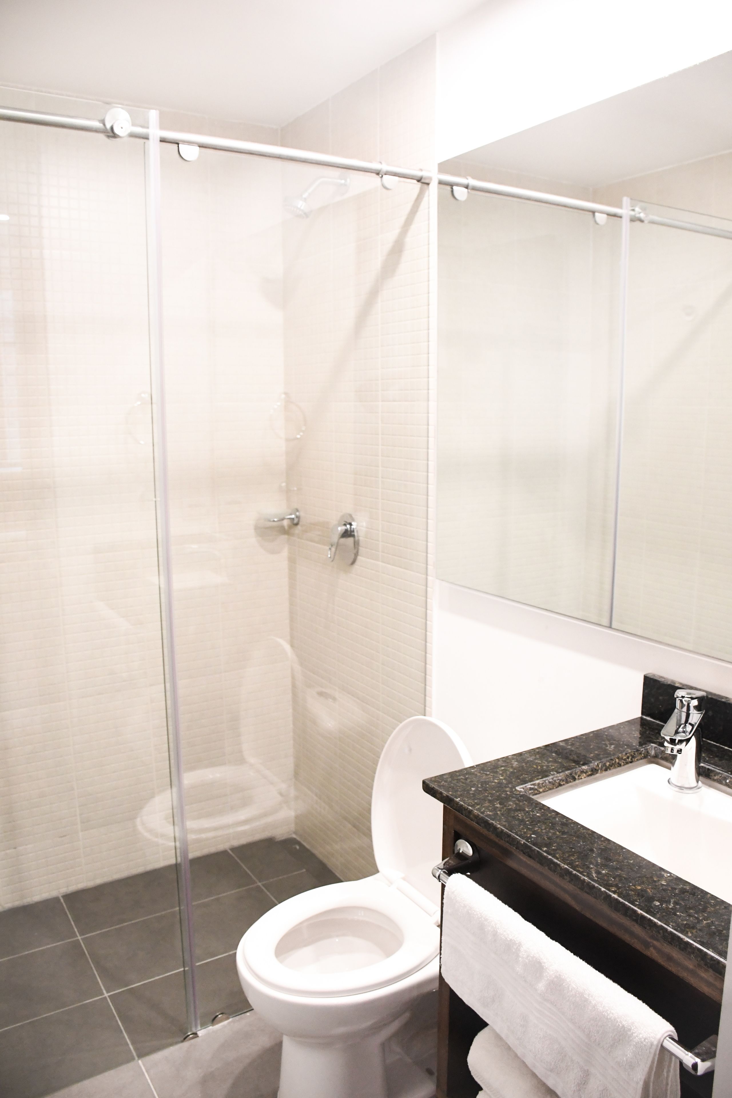 shower, rainfall showerhead, designer toiletries, towels